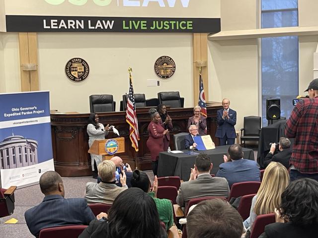 Governor Dewine signs pardons in the CSU College of Law Moot Court Room